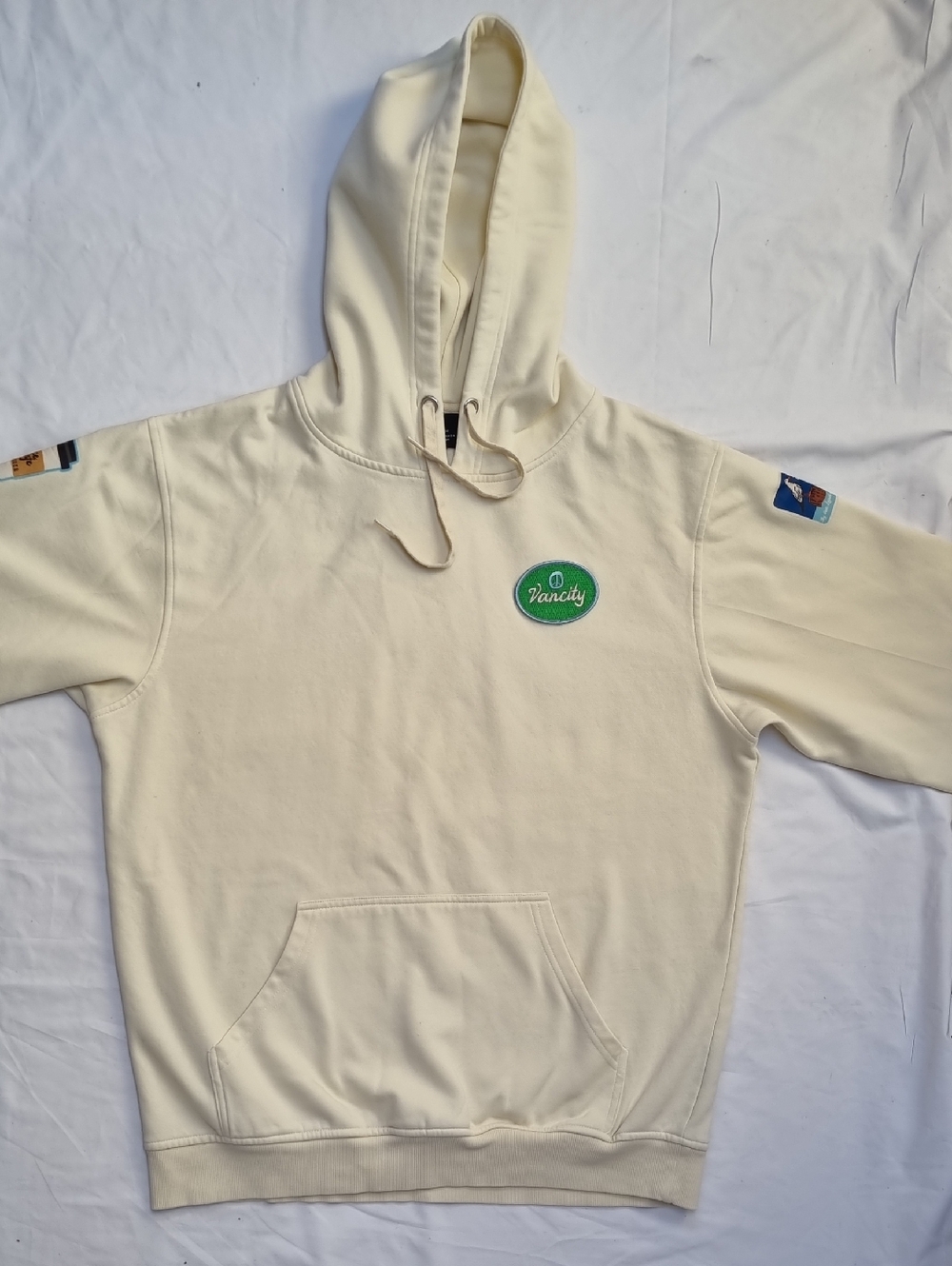 Vanity Cream Hooded Pullover with Green Logo Patch
